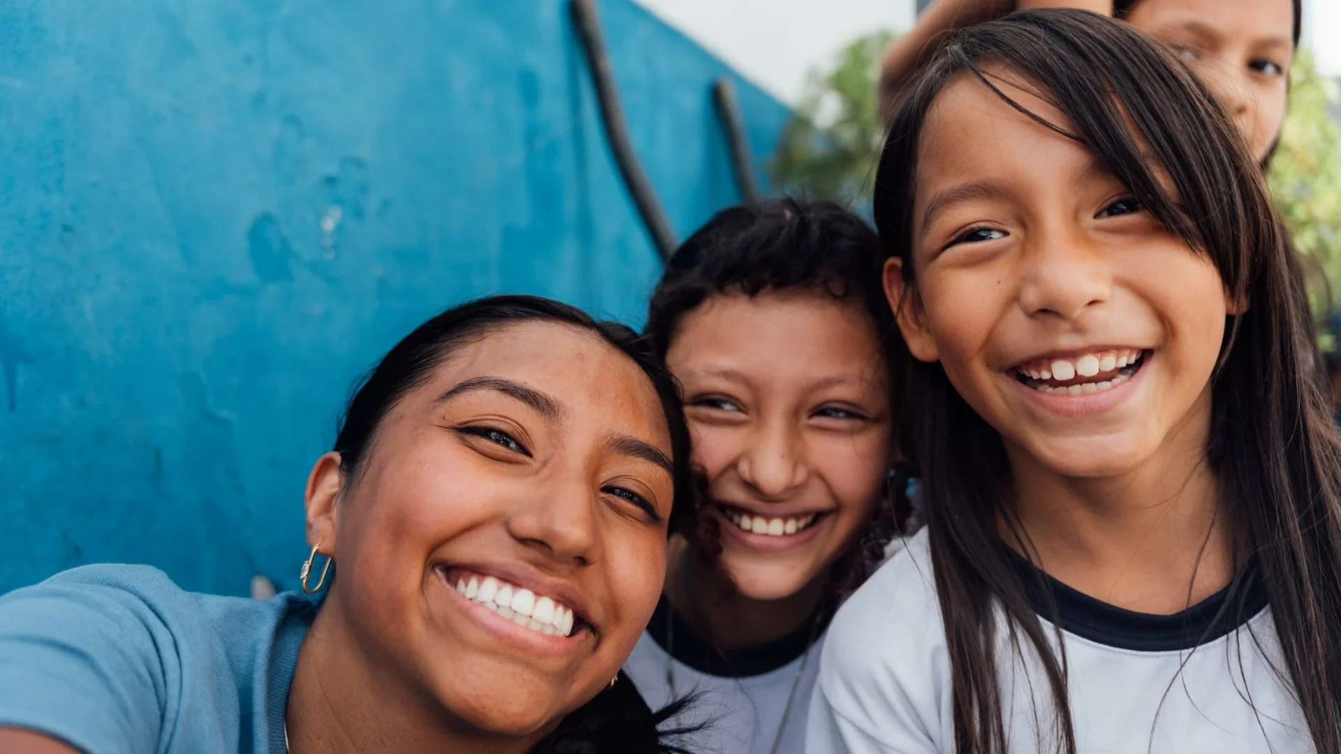 Children laughing in El Salvador after an Emmanuel mission visit